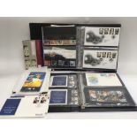 Two binders containing first day covers and stamps