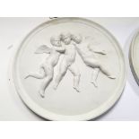 A Pair of Parian ware plaques of circular shape de