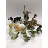 A collection of ceramic animal figures including a