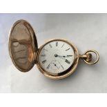 A gold coloured Waltham Hunters pocket watch in wo