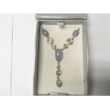 A Chalcedony and silver necklace. Weight approx