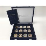 A cased set of 12 coins commemorating the 60th ann