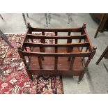 A modern design mahogany magazine rack.