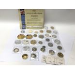 A collection of various Windsor Mint coins.