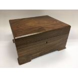 A walnut cigar humidor by Dunhill of London, appro