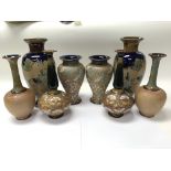 A collection of Royal Doulton including Doulton Slater vases.