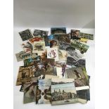 A small collection of mid 20th century postcards