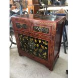 An Oriental style lacquered cabinet, approx 66cm x