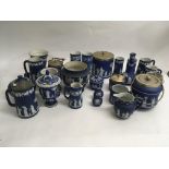 A collection of Wedgwood jasper ware including vas