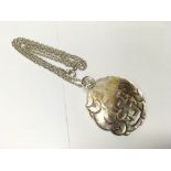 A silver chain with mother of pearl Oriental penda