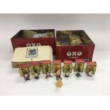 Two Oxo tins containing Disneykins figures, matchb