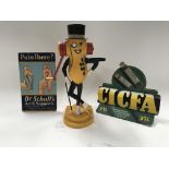 American Mr Peanut machine and two vintage shop advertising cards Dr Scholls and CICFA standing