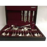 A cased part set of kings pattern silver cutlery