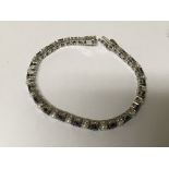 A black diamond and cultured pearl bracelet set in