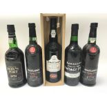 Five bottles of port predominantly from the 1970's