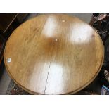 A circular mahogany dining table with cut down plinth possibly now a child’s dining table. Table