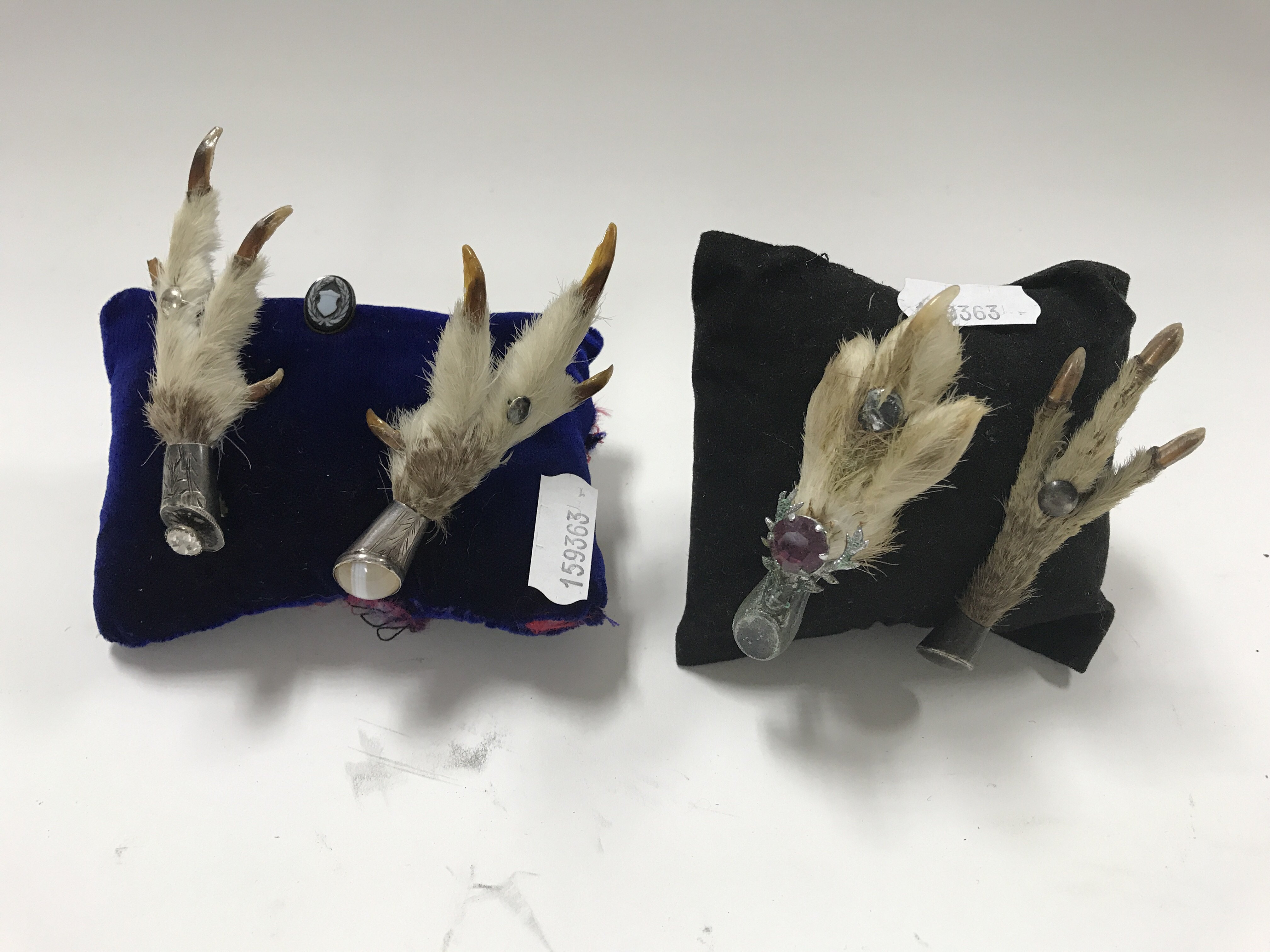 Four Victorian ptarmigan feet brooches.