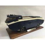 A well detailed scratch built petrol driven Freelance Amphibion WT8 dukw on a polished wooden