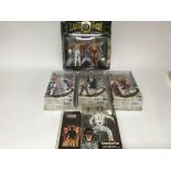 A collection of carded figures including Street fighter, WWE, Bubba Hotep