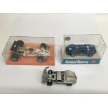 Three Italian Mebetoys cars comprising a boxed Ford Mark II and Grand Toros racing car and a