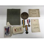 A collection of WW1 medals and ephemera awarded to Holt PTE, William Vernon 201067 of the 2nd/5th