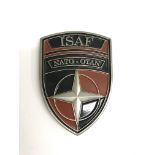 An ISAF NATO-Presentation medal for excellence signed, 4 Star, General David Petraeus.