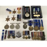 A collection of various medals including miniature dress medals etc.