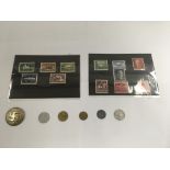 A Collection of German WW2 coinage, a party badge and stamp postcards