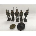 Five Lineol pre war composite hand painted soldiers and two Nazi badges.