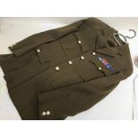 A pair of British army service dress. Size L/XL