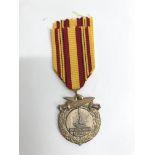 A commemorative Dunkirk 1940 medal.