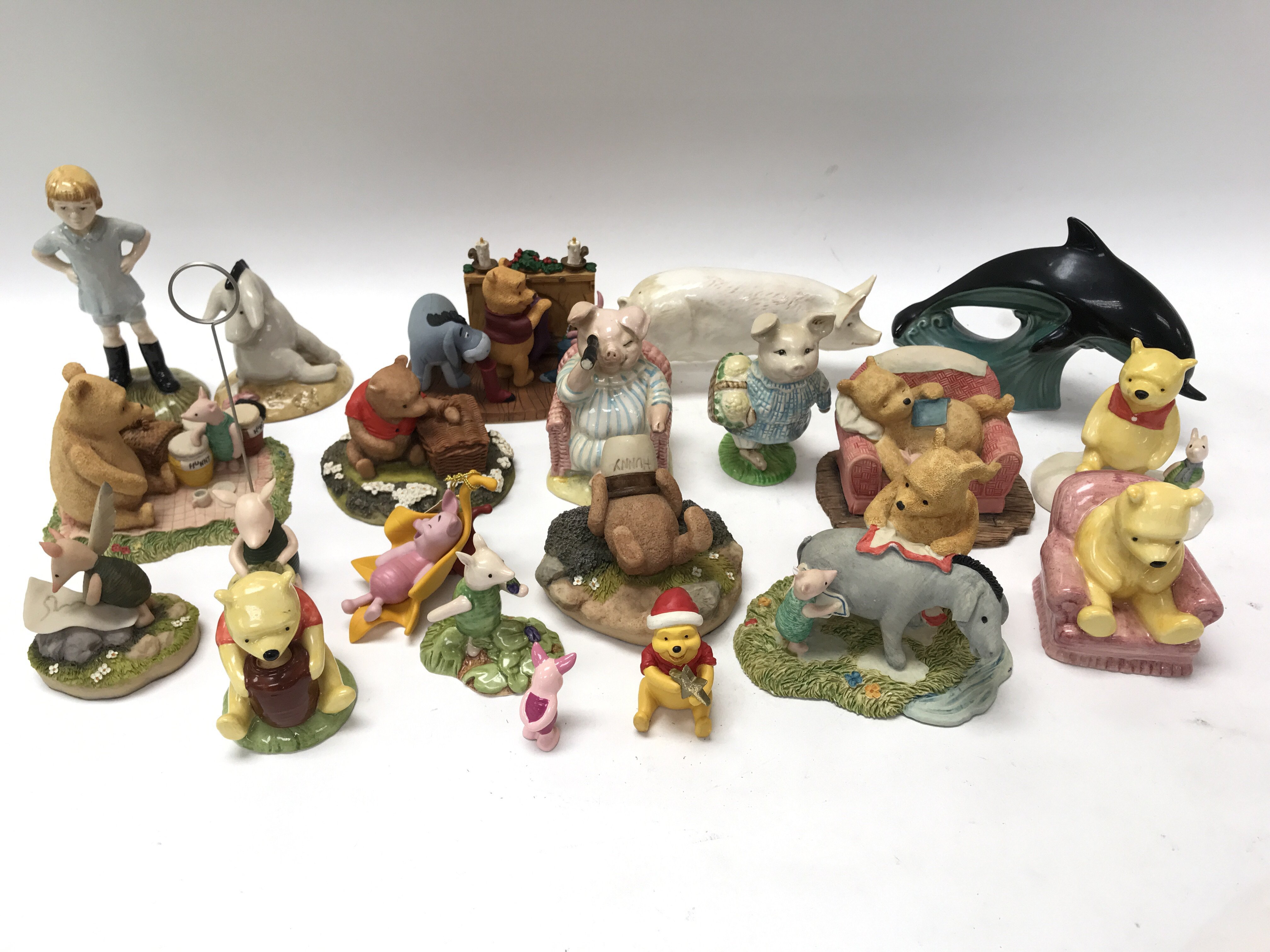 A collection of Doulton 'Winnie The Pooh' figures