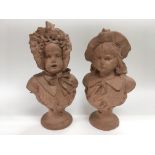 A pair of pottery busts of children, possibly Fren