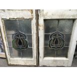 A pair of small stained glass windows, approx 37cm