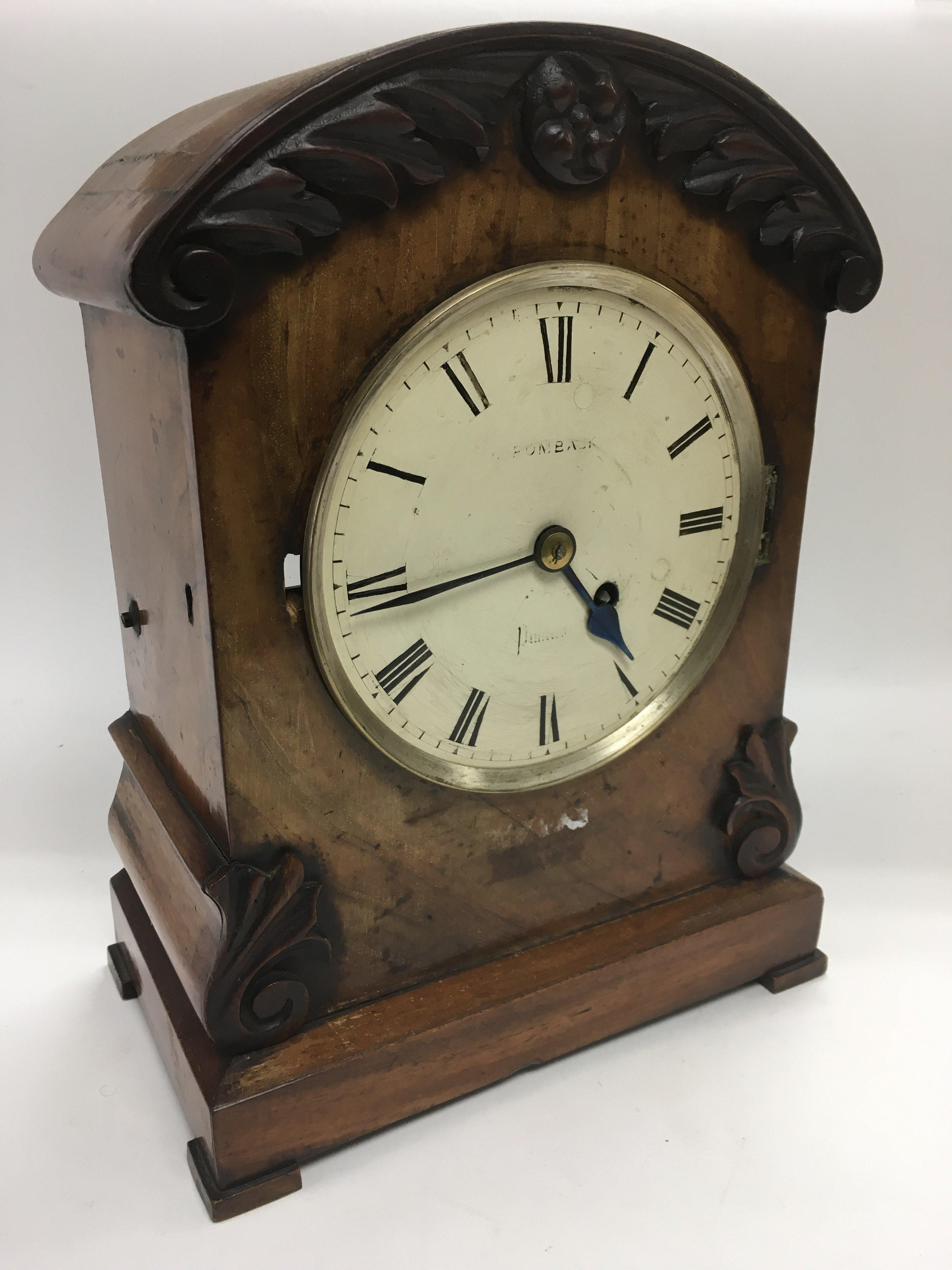 A mahogany single fusee mantle clock, approx heigh