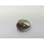 A 9ct gold ring set witha ruby, approx 5.2g and ap