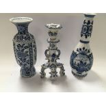 Two 20th century Delft vases and a conforming cand