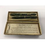 A boxed Conway Stewart writing set comprising a fo