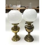 Two Victorian type table oil lamps with funnels an