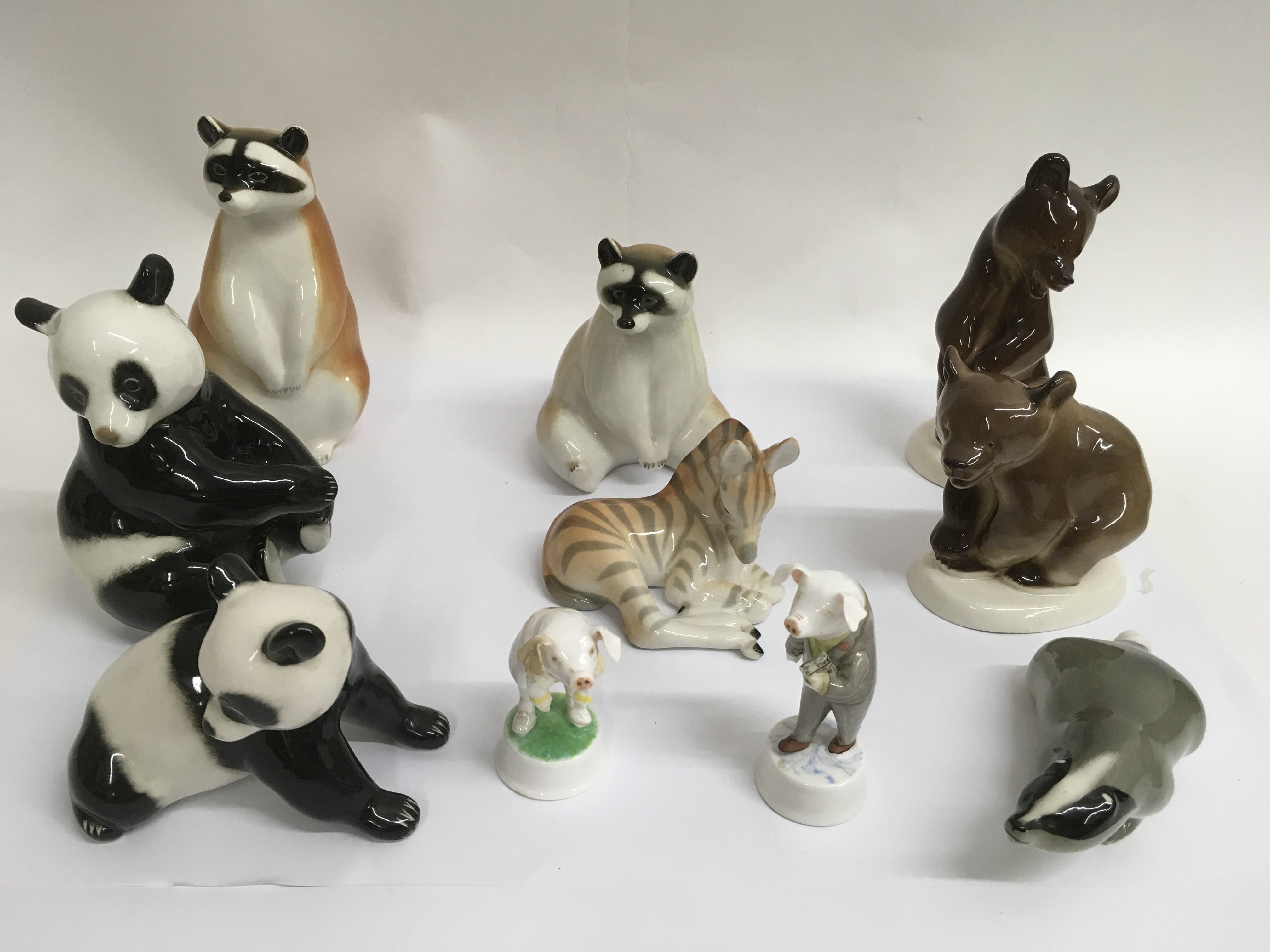 A collection of eight Lomonosov ceramic animals wi