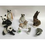 A collection of eight Lomonosov ceramic animals wi