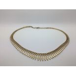 A ladies 9ct gold Cleopatra necklace weighing appr