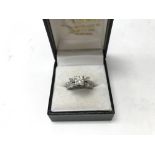 A white gold ring set with .75 carat (approx) diam