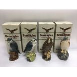 Four boxed Beneagles whisky decanters in the form