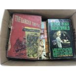 A box containing a quantity of war books