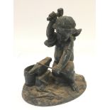 A spelter figure of cupid, approx