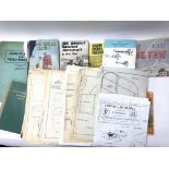 A collection of vintage plans and books for model