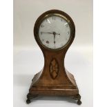 A Georgian inlaid walnut ballon clock with enamel