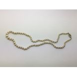 A string of cultured pearls, approx 44cm.