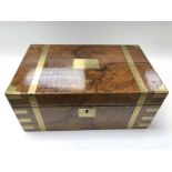 A brass bound walnut writing box.